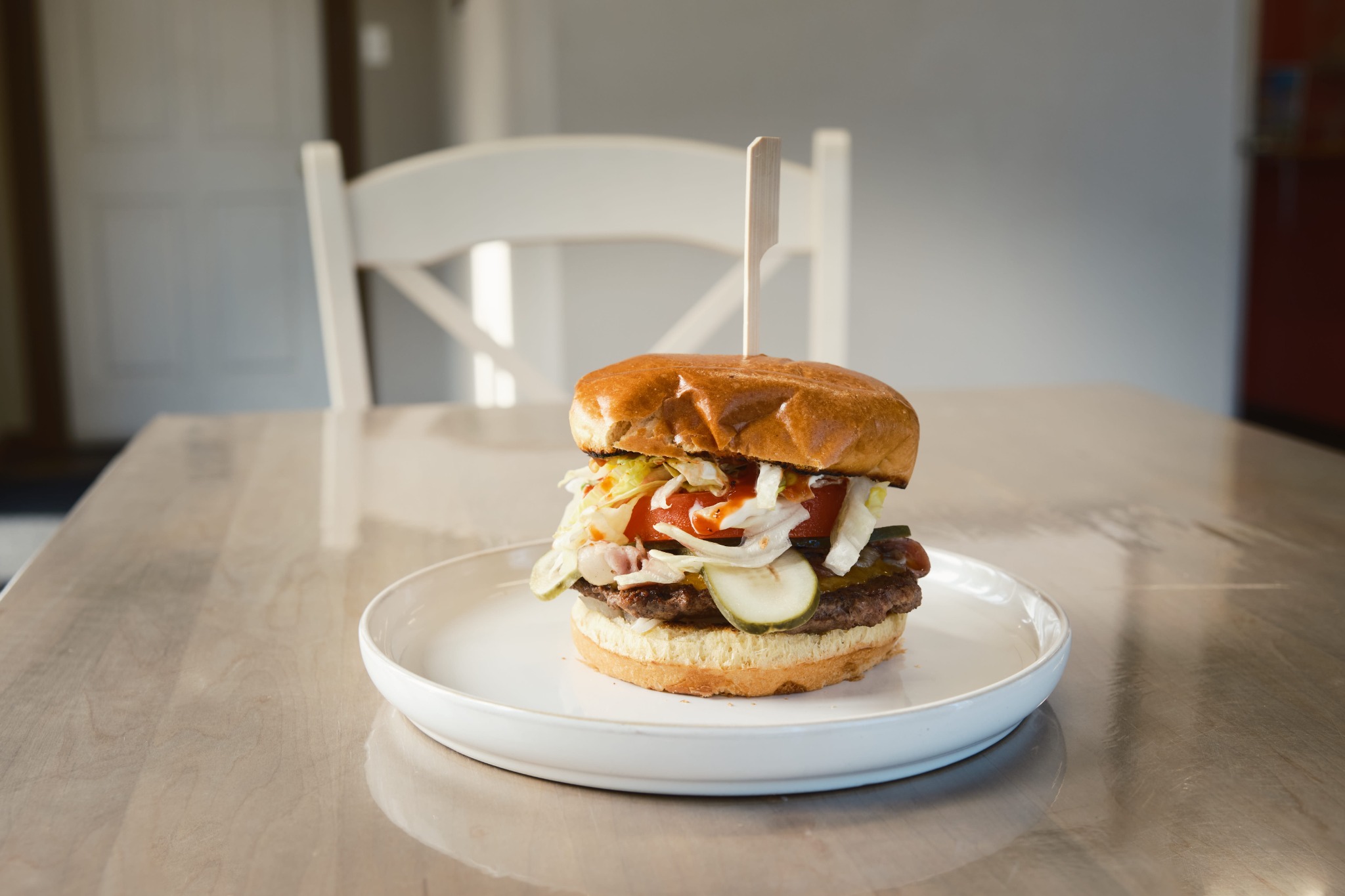 A juicy burger with crispy onion straws and cheese