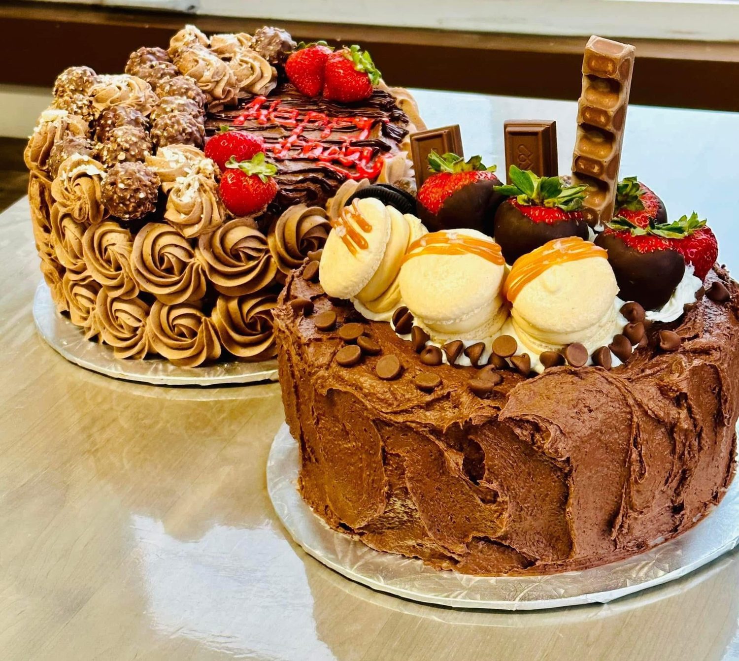Two decadent chocolate cakes with Ferrero, strawberries and macarons