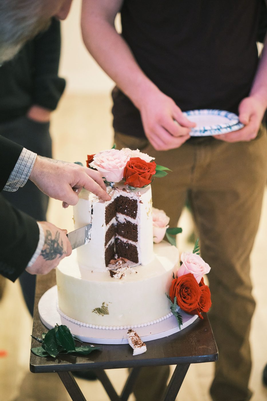 Wedding cake cut open to show rich chocolate layers