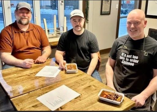 Chef Rob with guests at one of his cooking classes